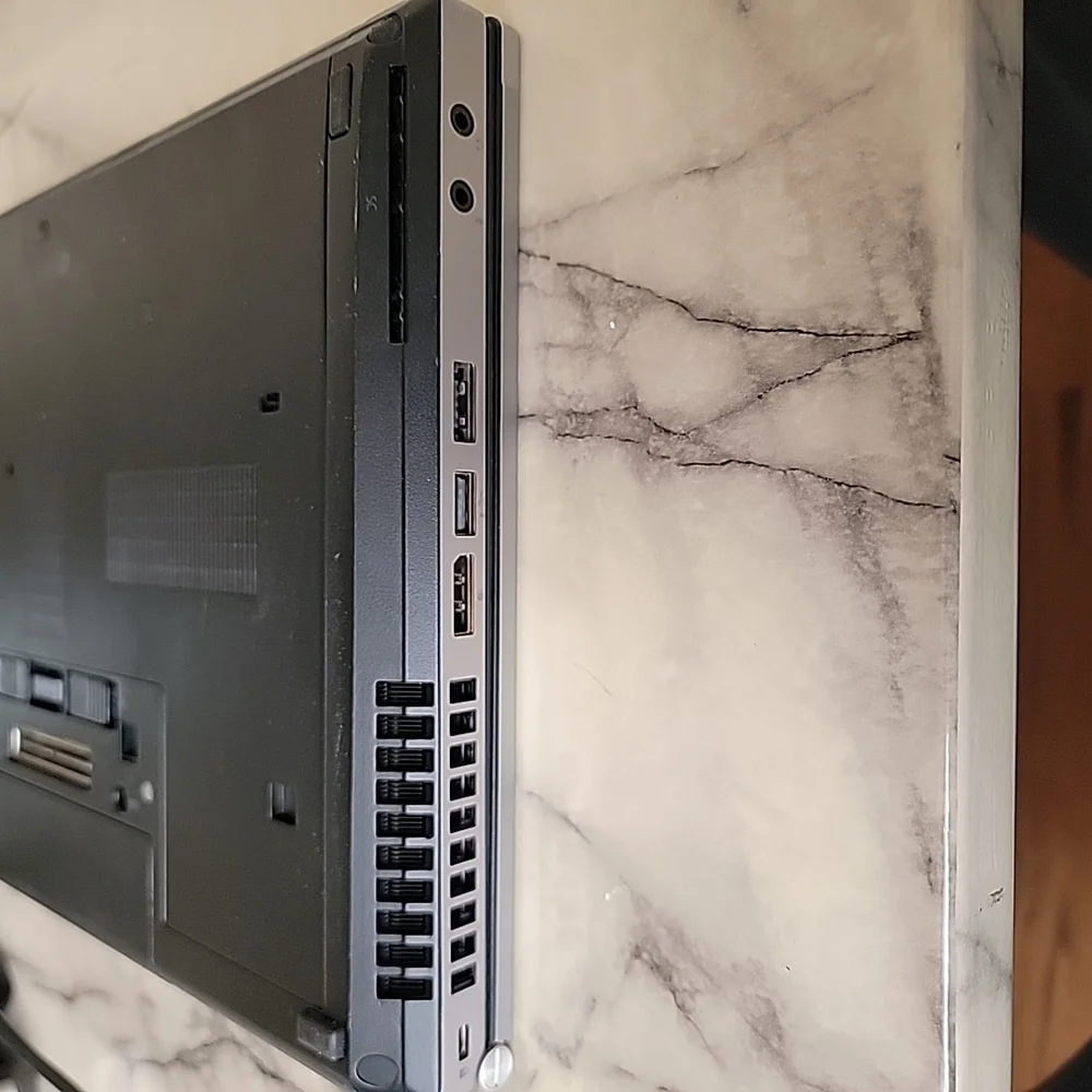 HP Silver and Black Laptop with Sleek Design and QWERTY Keyboard